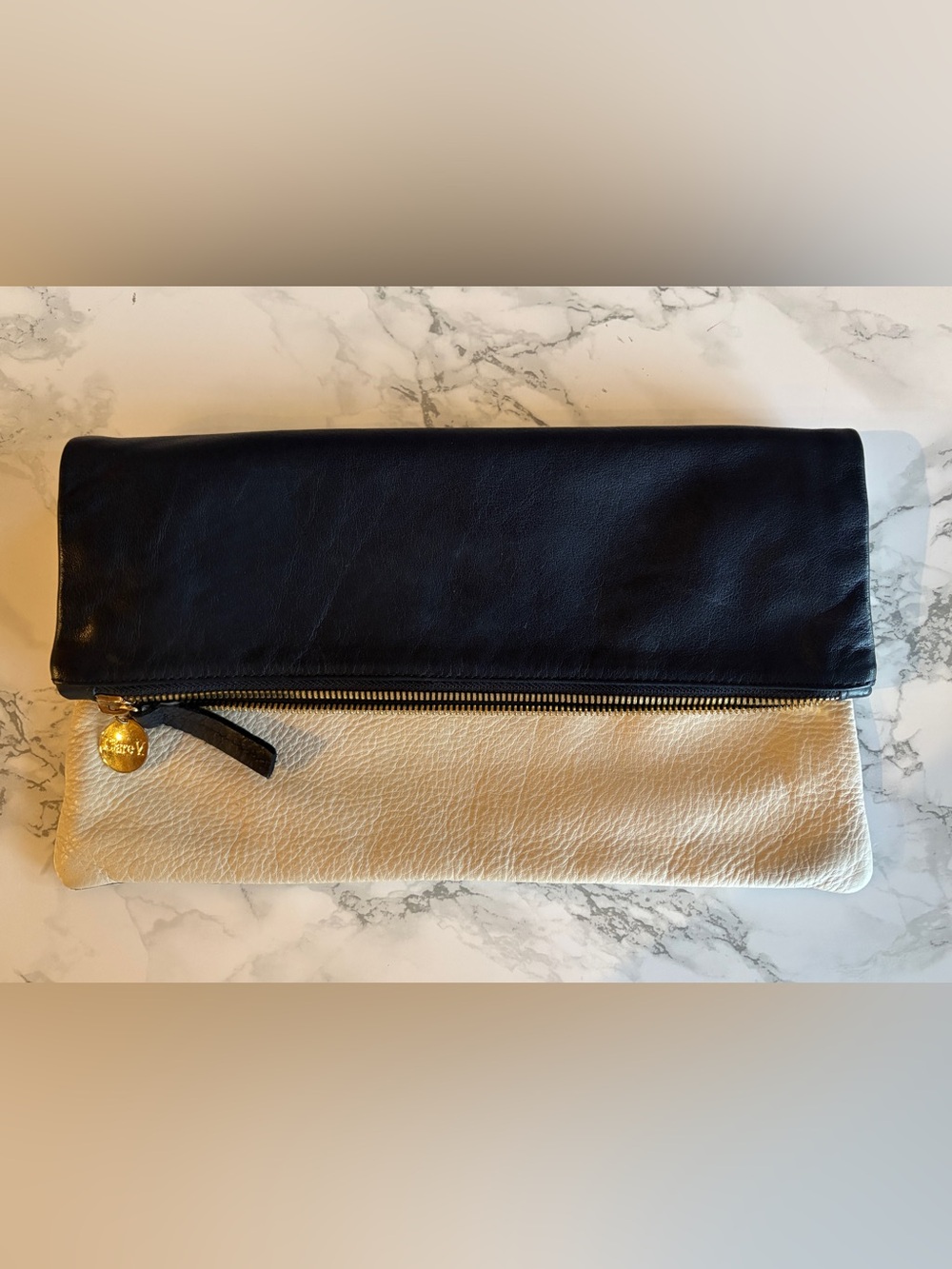 Clare V. Black and Cream Fold-Over Leather Clutch